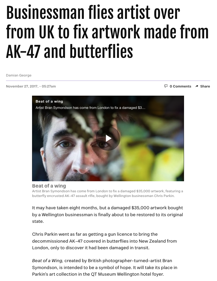 Businessman flies artist over from UK to fix artwork made from AK-47 and butterflies