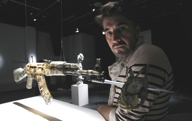 AKA Peace exhibition: AK47 assault rifles customised by artists at London's ICA by Artist Bran